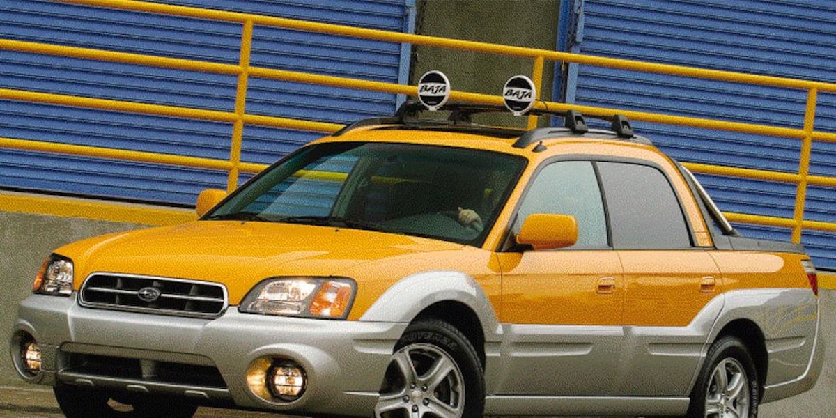 orginal press photos for the Subaru Baja in yellow with mounted trail lights