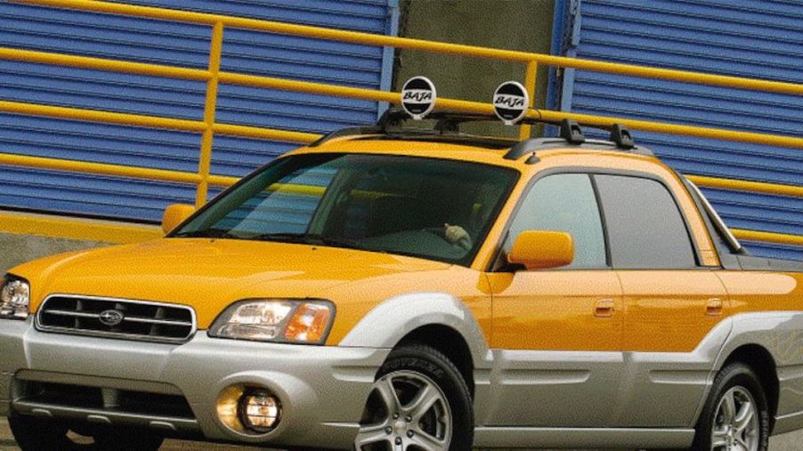 orginal press photos for the Subaru Baja in yellow with mounted trail lights