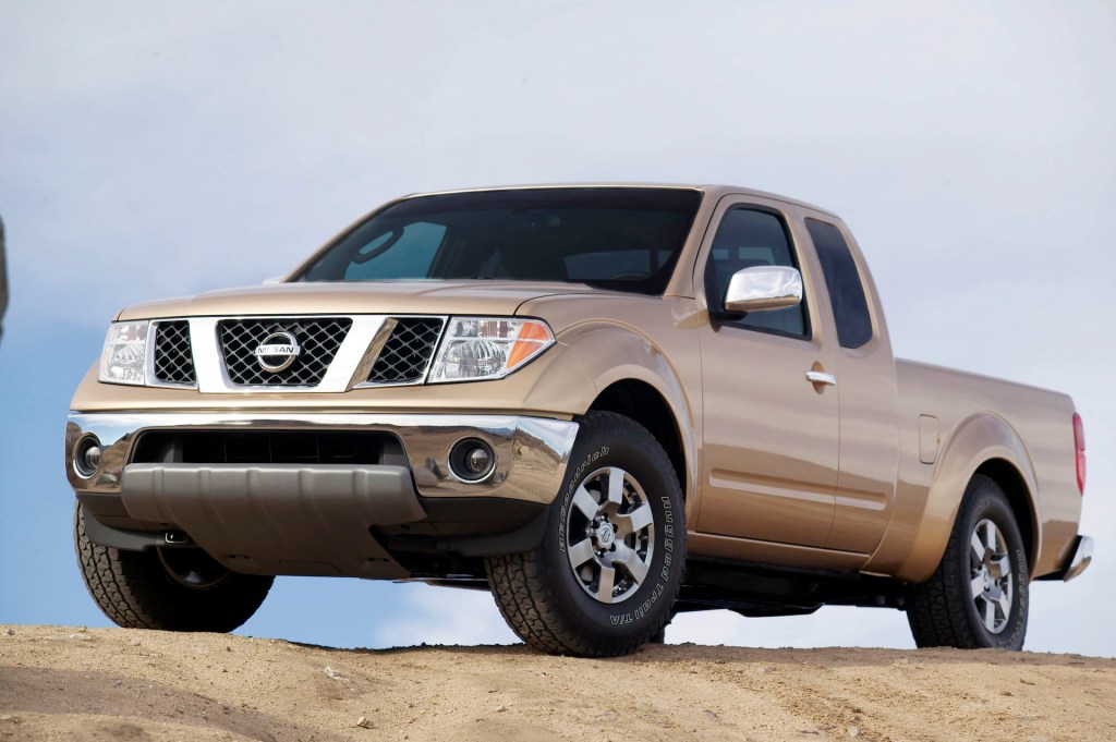 An image of a Nissan Frontier parked outdoors.