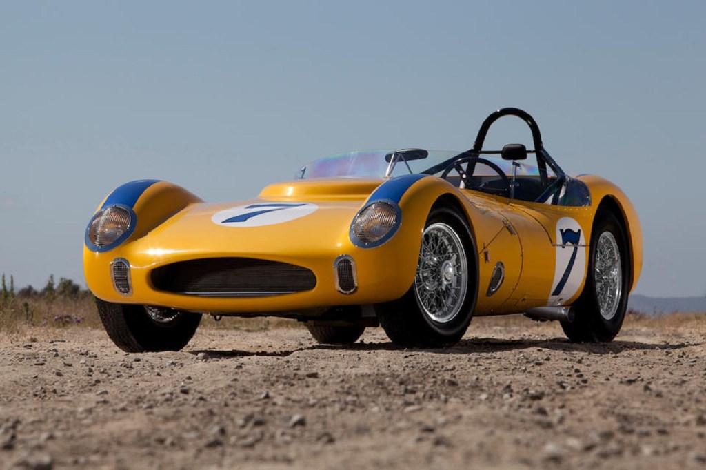 The yellow-with-blue-stripes 1961 Old Yeller VII in the desert