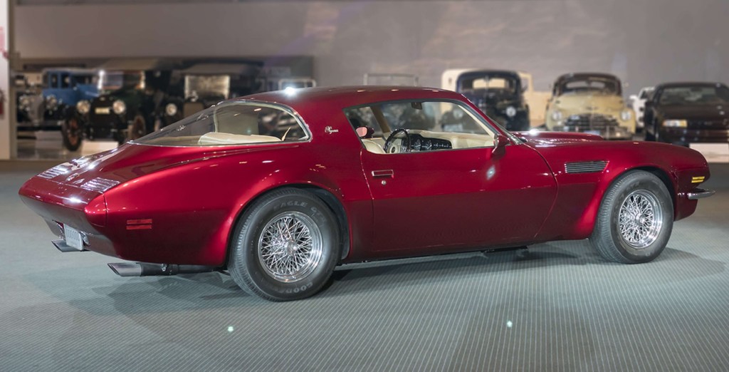 The side 3/4 view of the red 1970 Pontiac Pegasus Concept in the GM Heritage Center