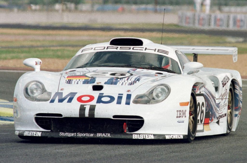 A Mobil-liveried 1998 Porsche 911 GT1 24 Hours of Le Mans race car at the track