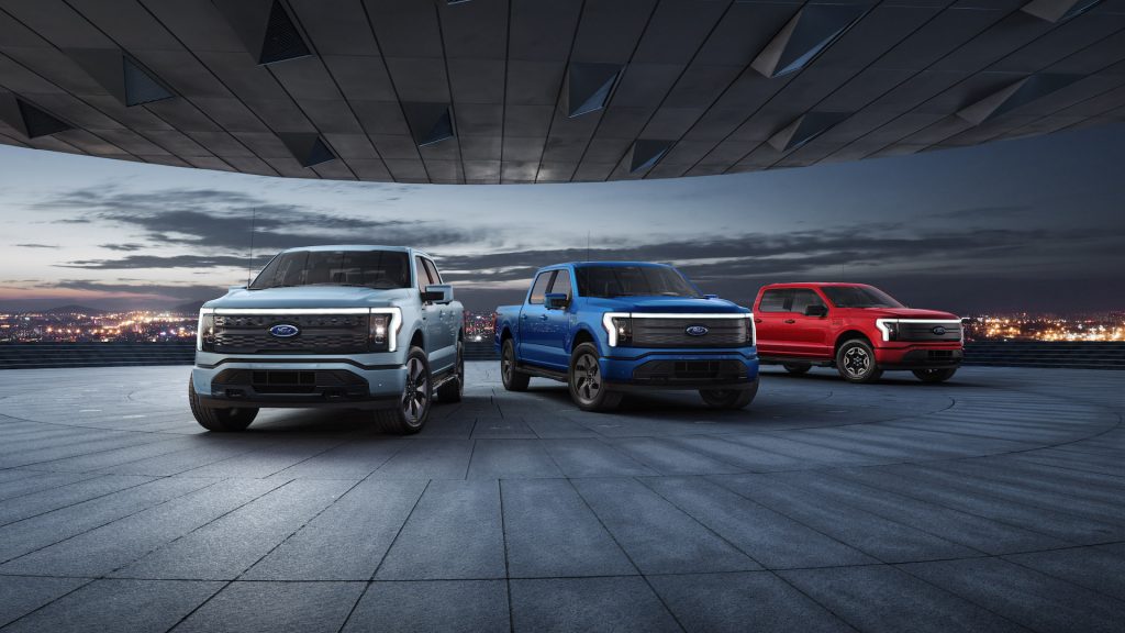 An image of a 2022 Ford F-150 Lightning parked outdoors.