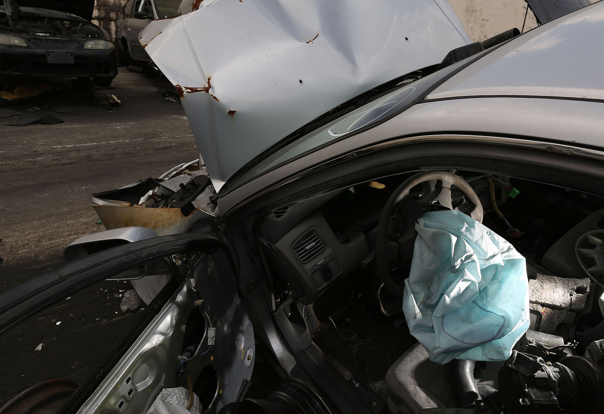A deployed airbag is seen in a 2001 Honda Accord at the LKQ Pick Your Part salvage yard on May 22, 2015, in Medley, Florida