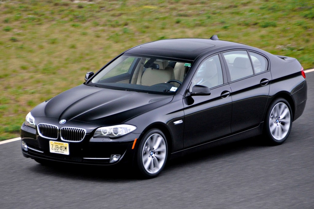 A black 2011 BMW 550i sport sedan is driven at New Jersey Motorsport Park in Millville, New Jersey, on Tuesday, May 11, 2010