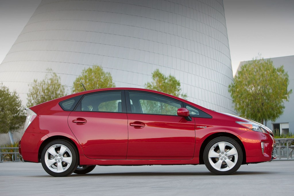 A red 2012 Toyota Prius, one of KBB's picks for the best affordable used cars