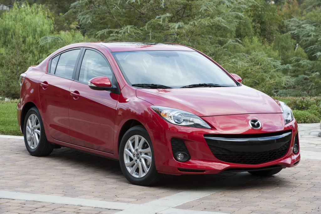 A red 2013 Mazda3