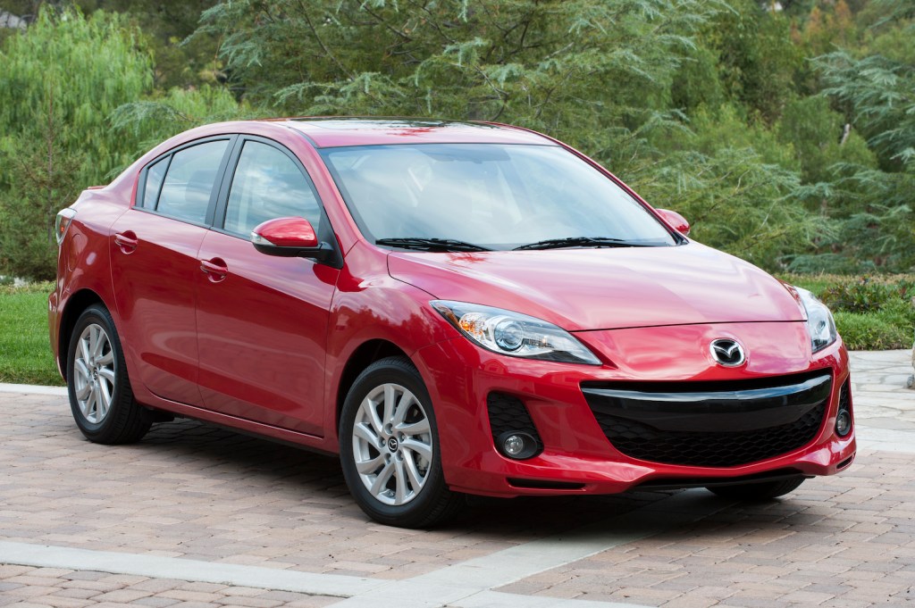 A red 2013 Mazda3