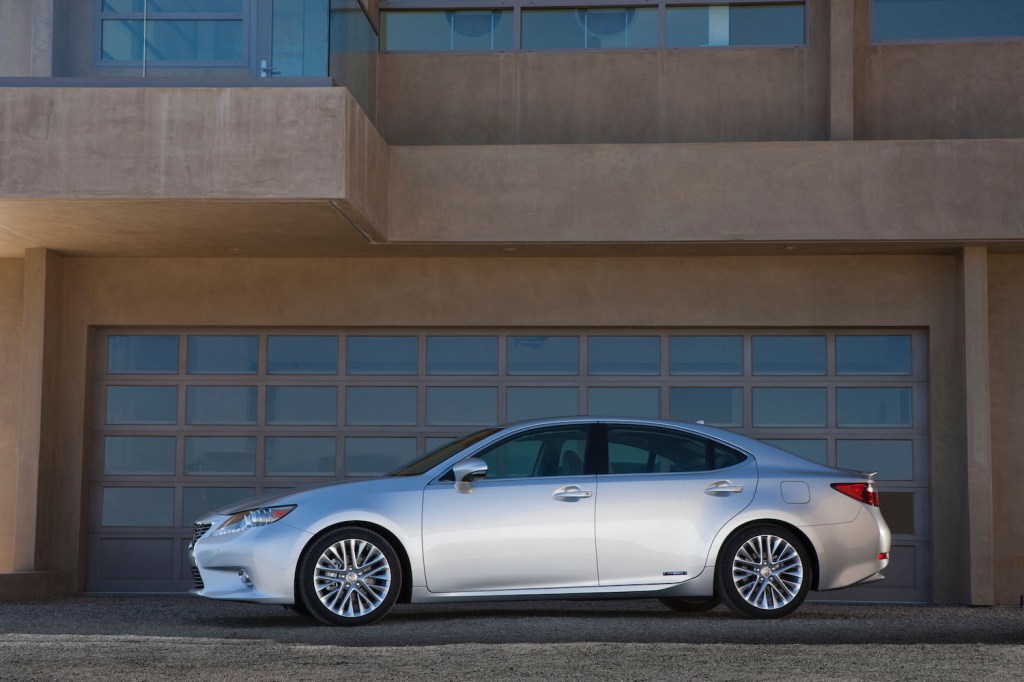 A silver 2013 Lexus ES parked, the Lexus ES is one of the best used luxury cars under $20,000
