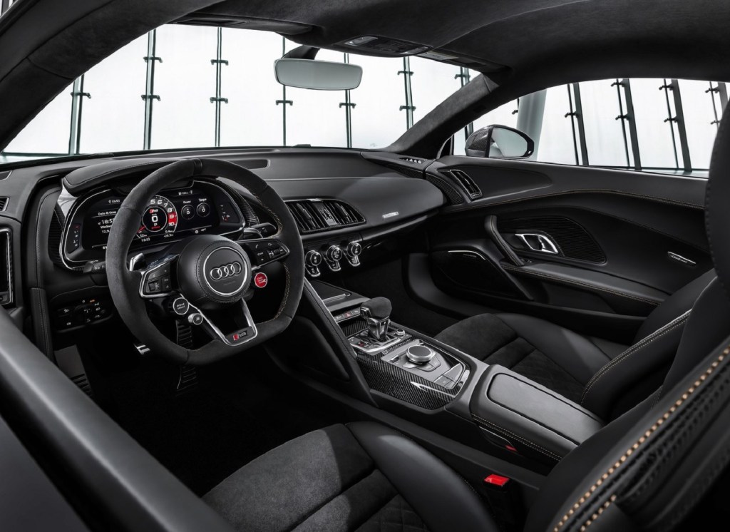 The black-and-carbon-fiber-trimmed interior of a 2020 Audi R8 V10 Decennium