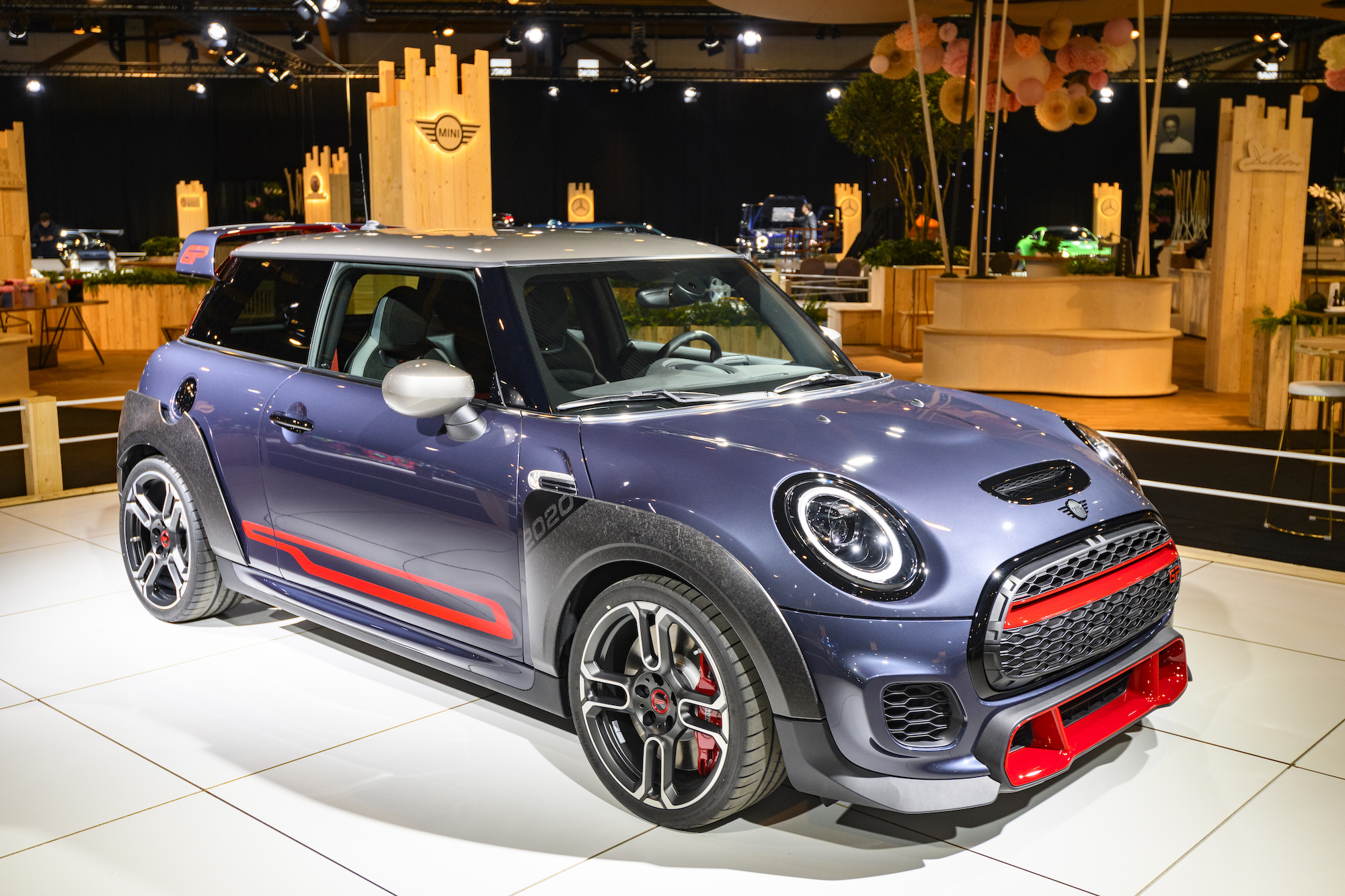 A blue and red 2020 Mini Cooper John Cooper Works subcompact car on display at Brussels Expo on January 9, 2020, in Brussels, Belgium
