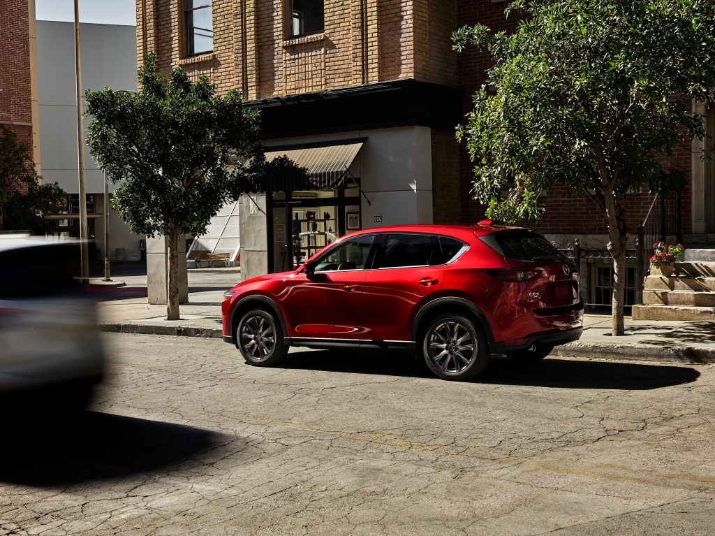 An image of a red Mazda CX-5 parked outdoors.