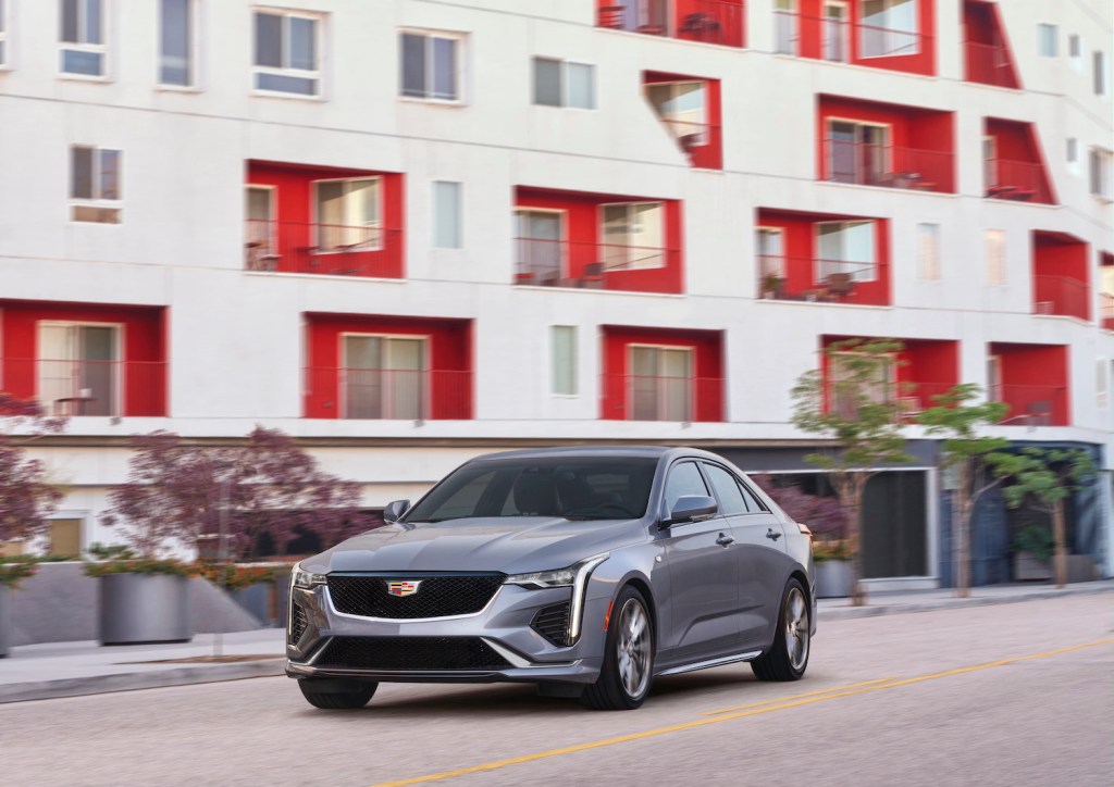 A silver 2021 Cadillac CT4 driving, one of the best affordable luxury cars under $35,000