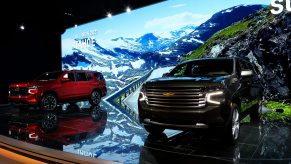 A Chevrolet Tahoe and Suburban on display.