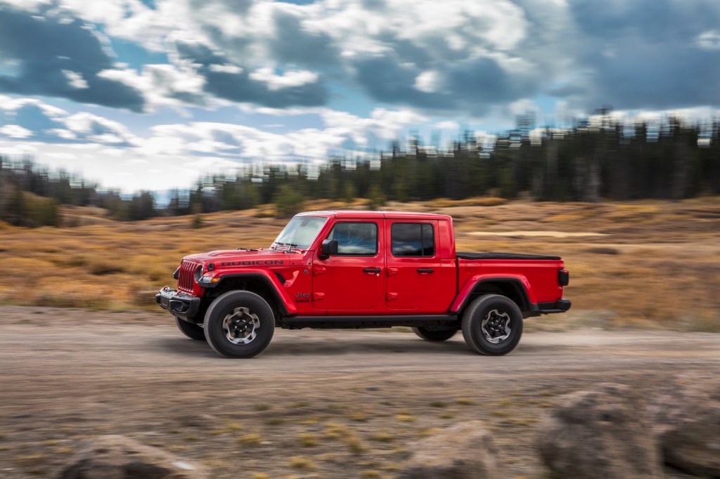 Red 2021 Jeep® Gladiator Rubicon driving