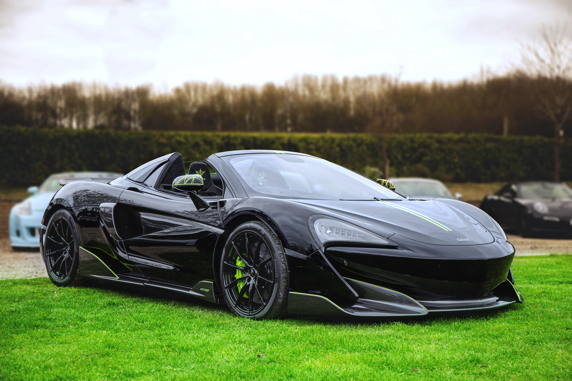 A black McLaren 600LT convertible sports car at the Sharnbrook Hotel on March 21, 2021, in Bedfordshire, England