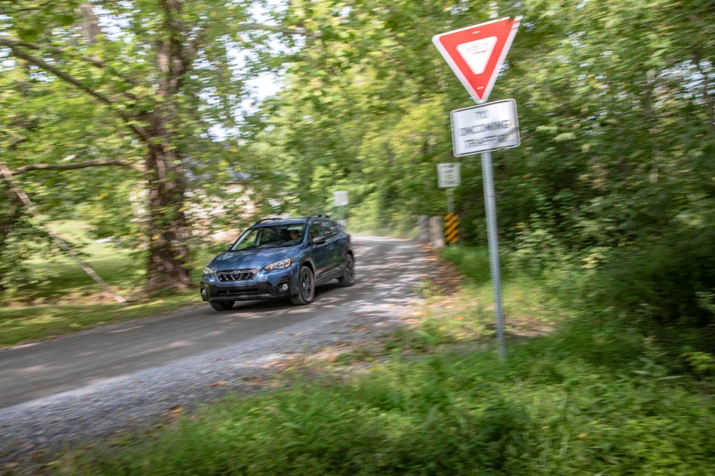 2021 Subaru Crosstrek driving through the forest