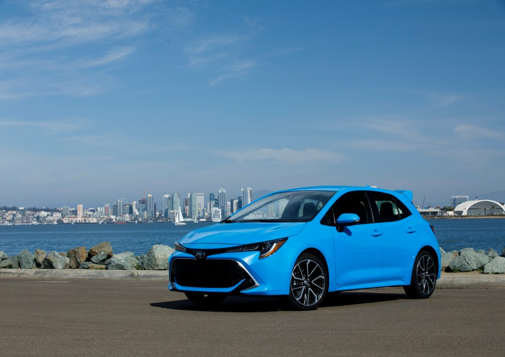 A blue 2021 Toyota Corolla Hatchback, one of the best new affordable cars with a manual transmission