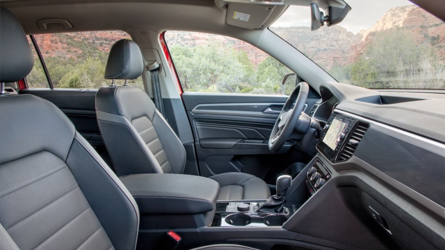 The gray interior of a red 2021 Volkswagen Atlas midsize SUV