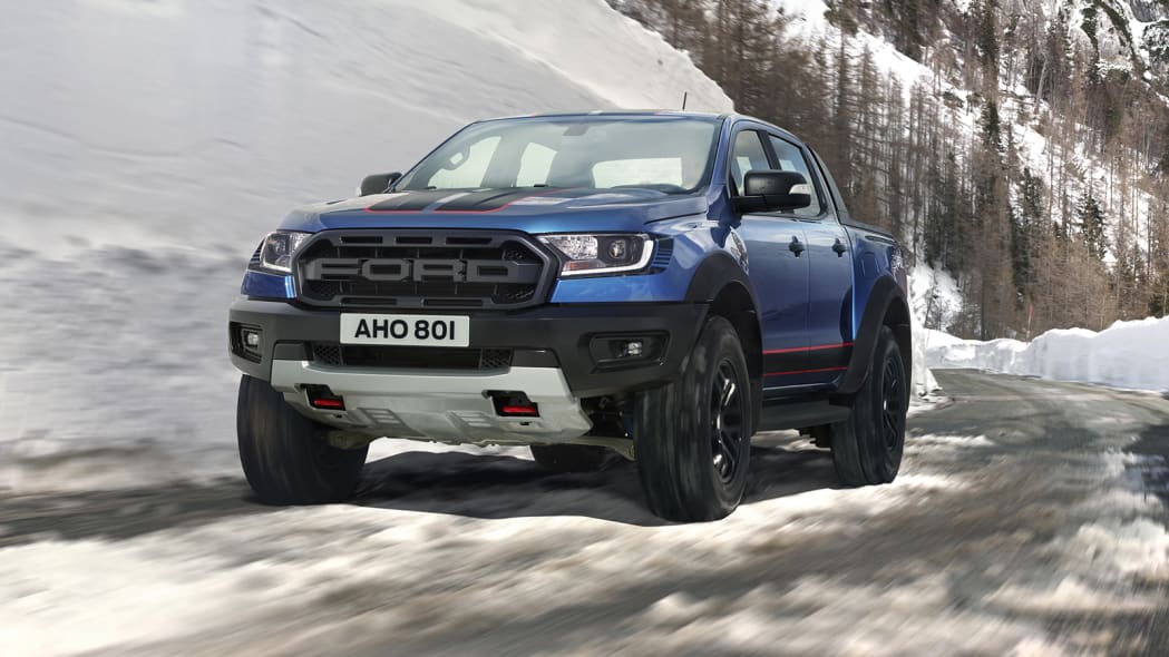 A blue 2021 Ford Ranger Raptor parked in snow