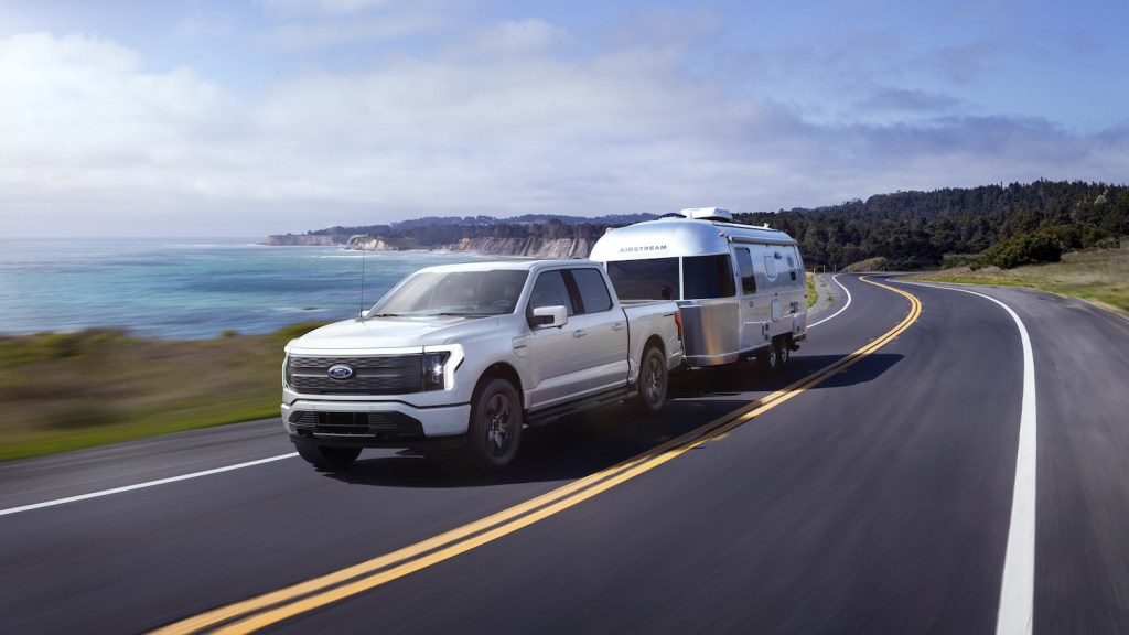 The 2022 Ford F-150 Lightning Lariat seen towing an RV, the F-150 Lightning is Ford's first electric pickup truck. There are five most important things to know about towing a camper