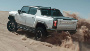 2022 GMC Hummer kicking up sand at the dunes