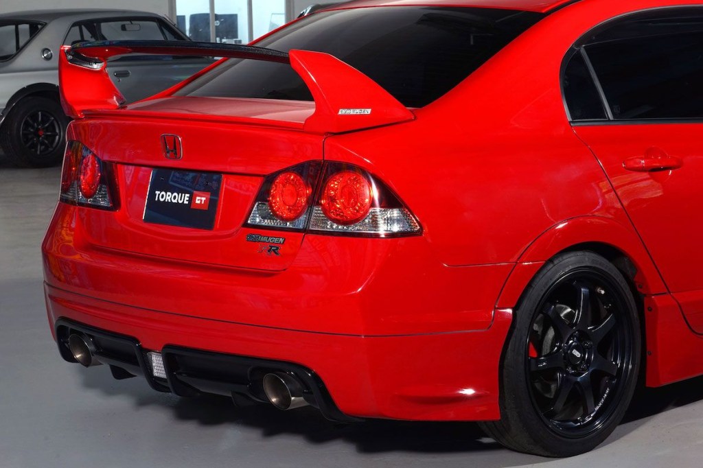 An image of a red Honda Civic Mugen RR in a dealership.