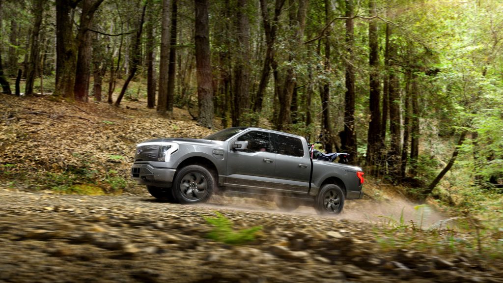 An image of a 2022 Ford F-150 Lightning parked outdoors.