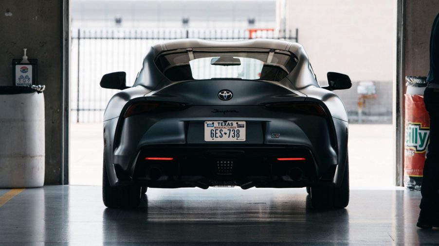 the rear view of the 2021 Toyota Supra the garage