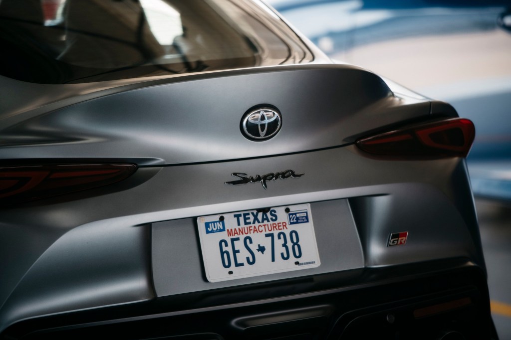 a close of of the rear of the Supra with Texas plates