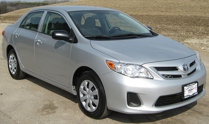a silver used Toyota Corolla from the 2011 model year 