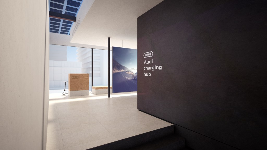 The interior of Audi's new charging hub concept with wood, tile and black walls