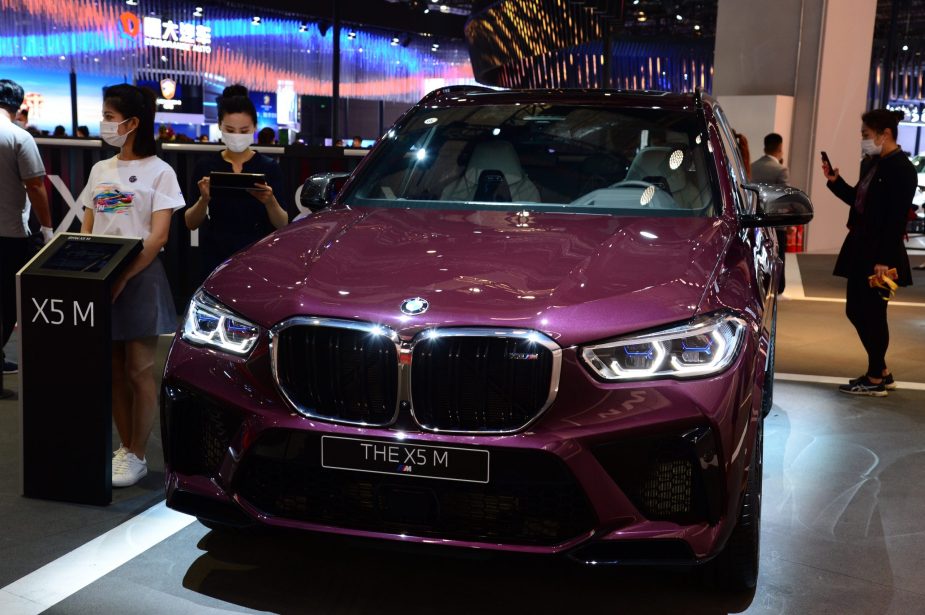 A purple BMW X5 M SAV is on display during the 19th Shanghai International Automobile Industry Exhibition (Auto Shanghai 2021)