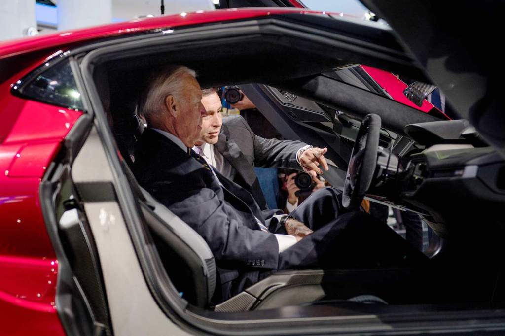 CORRECTION - President and CEO of Ford Motor Company Mark Fields (R) shows US Vice President Joe Biden (L) the Ford GT, President Biden will visit Dearborn to see the Ford F-150 Lightning EV pickup next week