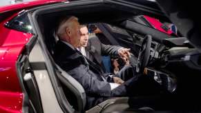 CORRECTION - President and CEO of Ford Motor Company Mark Fields (R) shows US Vice President Joe Biden (L) the Ford GT, President Biden will visit Dearborn to see the Ford F-150 Lightning EV pickup next week