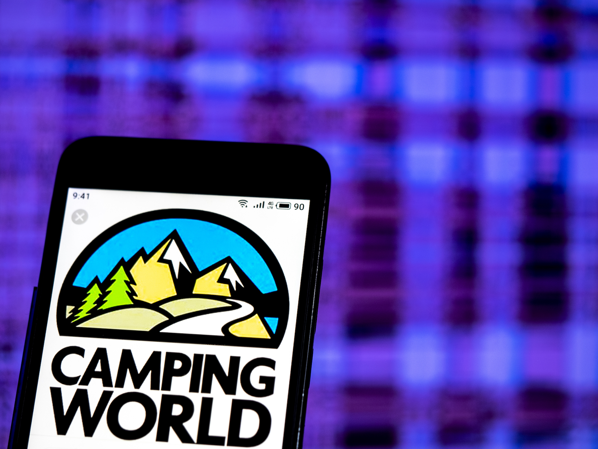 The Camping World logo displayed on a smartphone