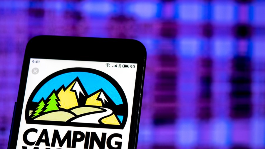 The Camping World logo displayed on a smartphone
