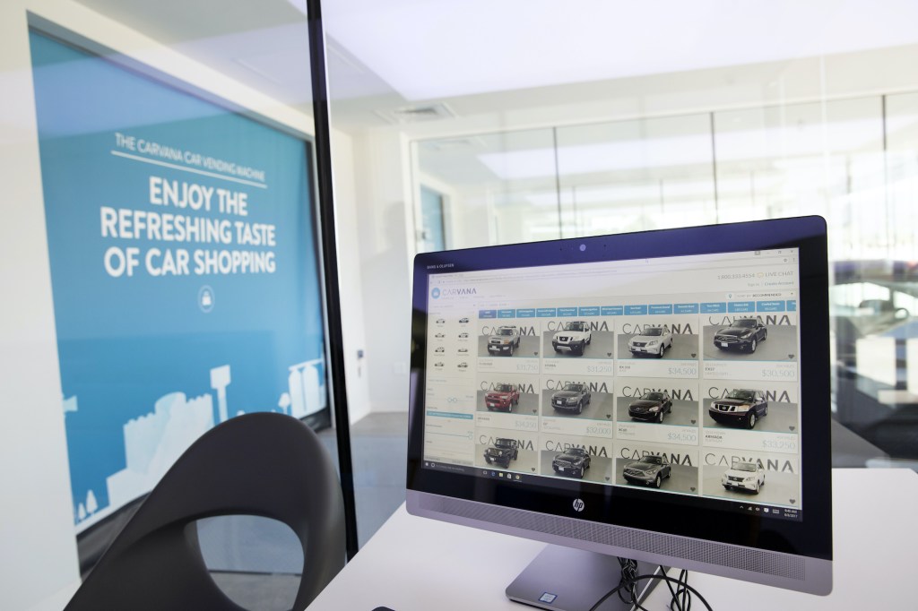 A computer monitor displayed available vehicles inside the Carvana Co. car vending machine.