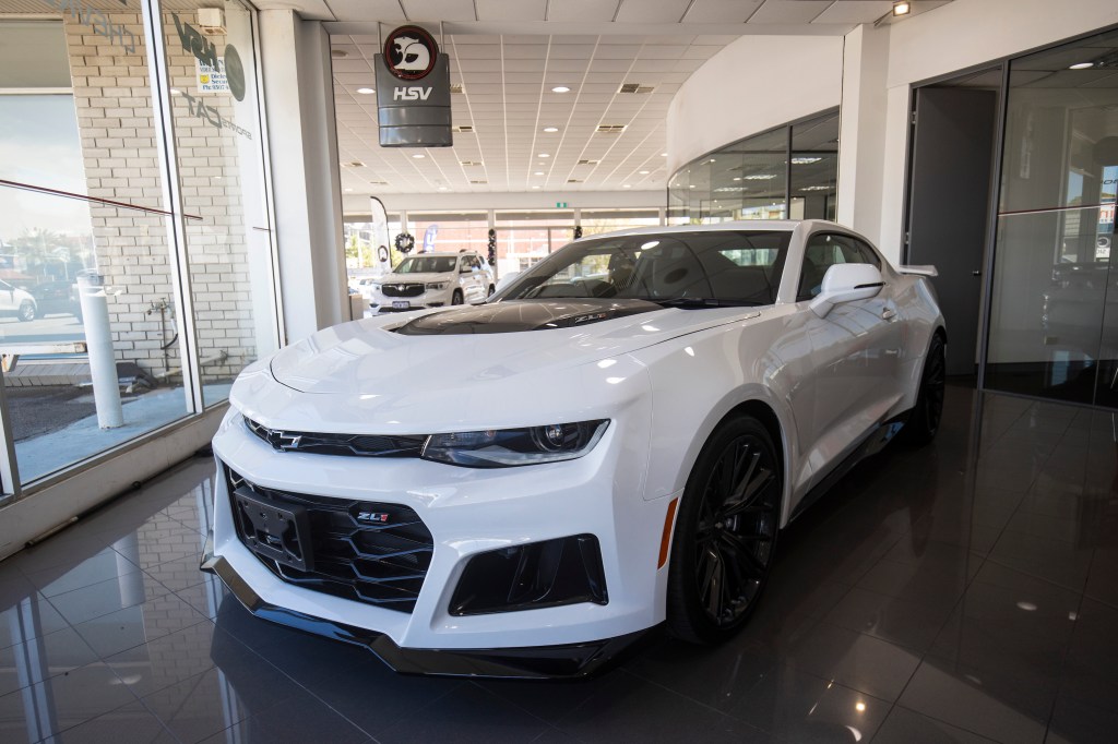 A white Chevrolet Camaro vehicle is seen at a Holden dealership on January 4, 2021
