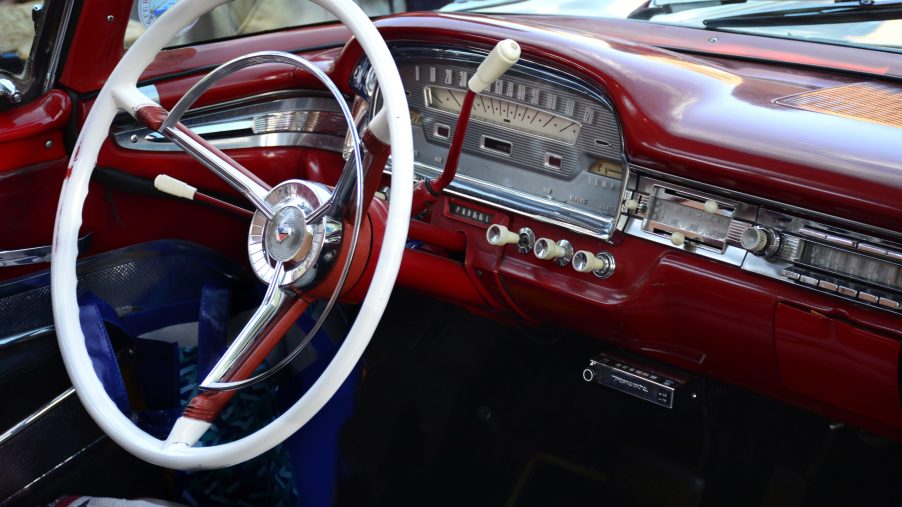 White steering wheel of a classic 1956 Ford Fairlane
