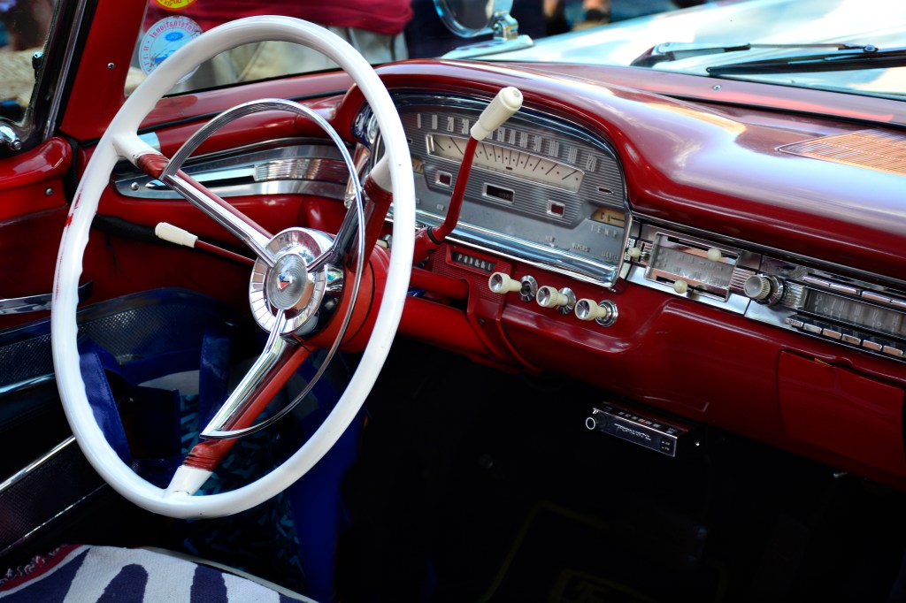 White steering wheel of a classic 1956 Ford Fairlane