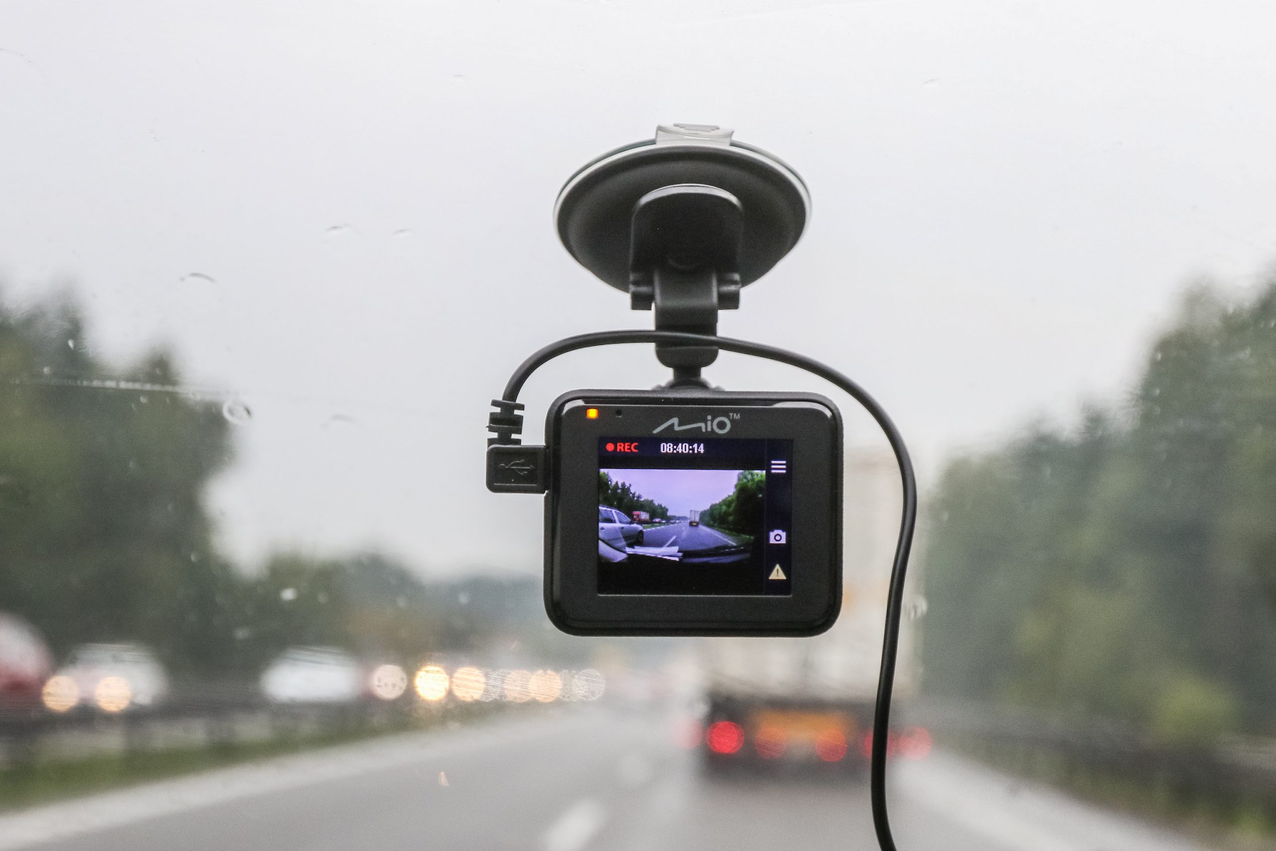 Mio dash cam mounted in car is seen in Gdansk, Poland on 14 August 2018 Sales of car cameras (dash cams) is growing in Poland