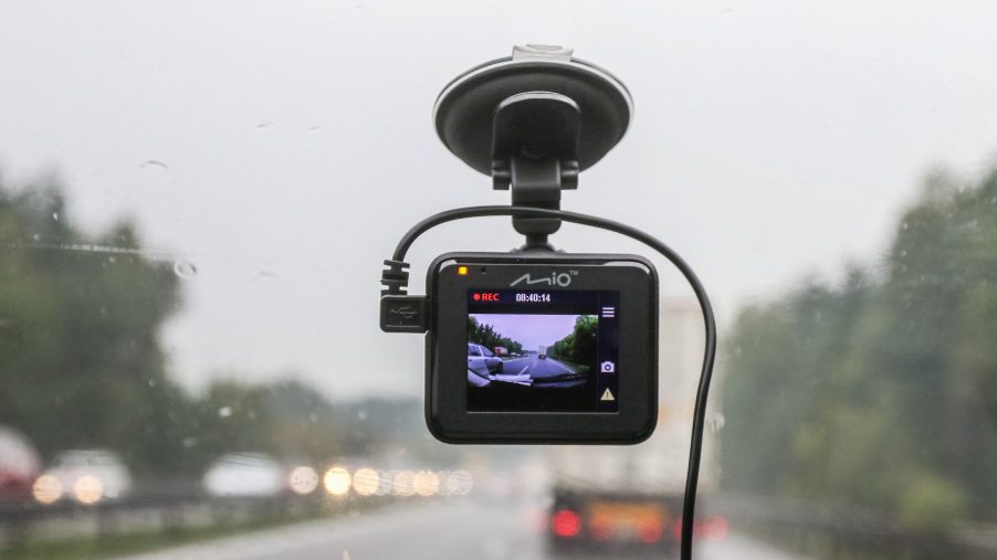 Mio dash cam mounted in car is seen in Gdansk, Poland on 14 August 2018 Sales of car cameras (dash cams) is growing in Poland