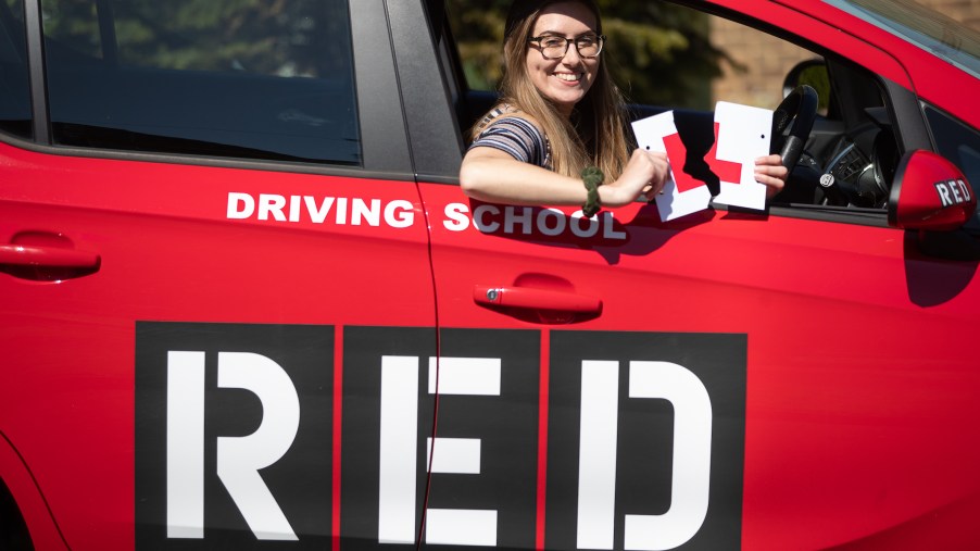 Jade Bone, 24, celebrates passing her driving test at a test centre in Southampton, Hampshire, where examinations have resumed under the latest easing of lockdown restrictions