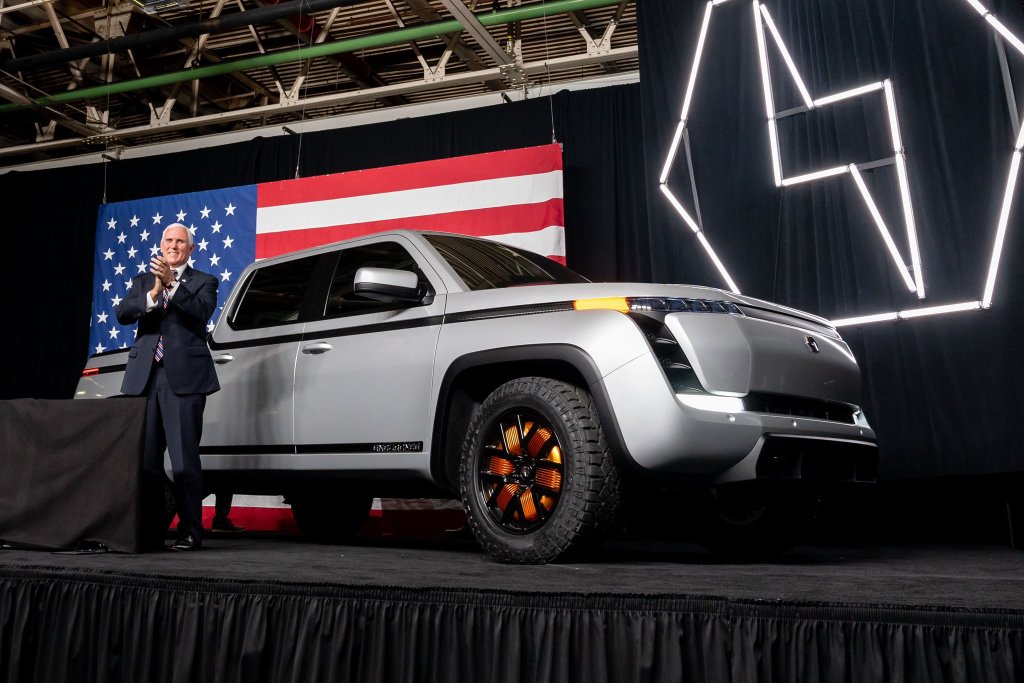Endurance EV pickup with Pence standing by