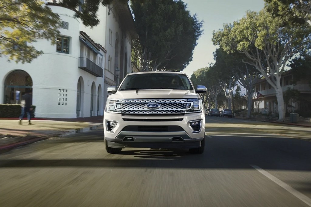 A 2021 Ford Expedition traveling down a street.