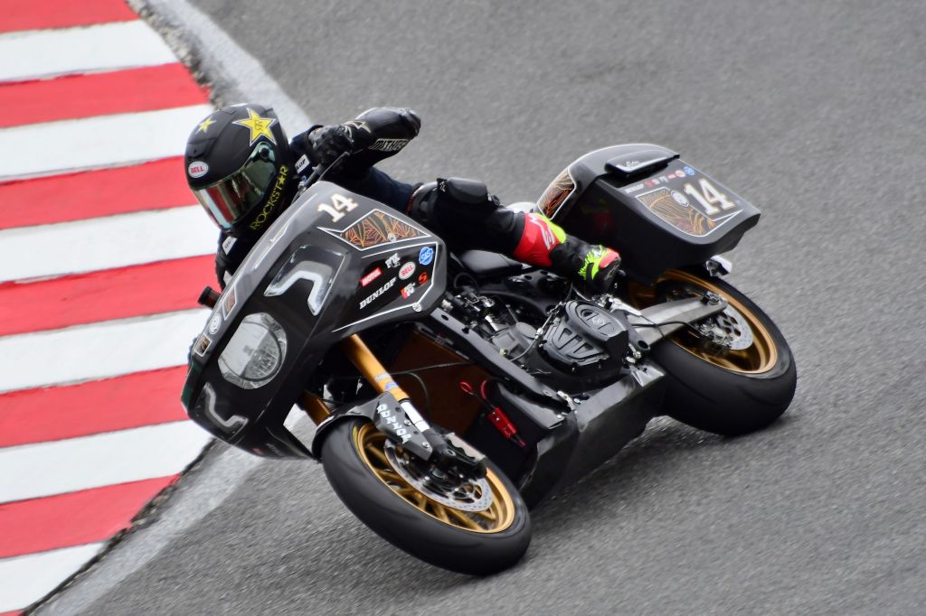Frankie Garcia takes a corner on the black-and-gold 2021 RSD King of the Baggers Indian Challenger