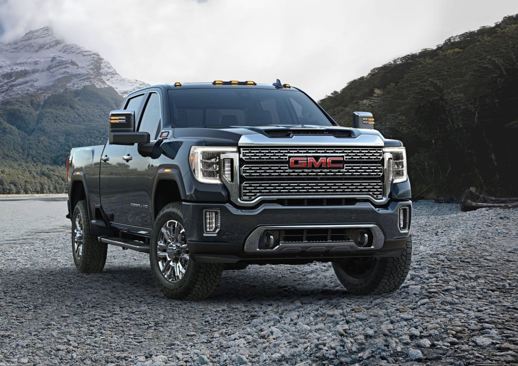 An image of a 2021 GMC Sierra HD parked outdoors shows off the big pickup truck