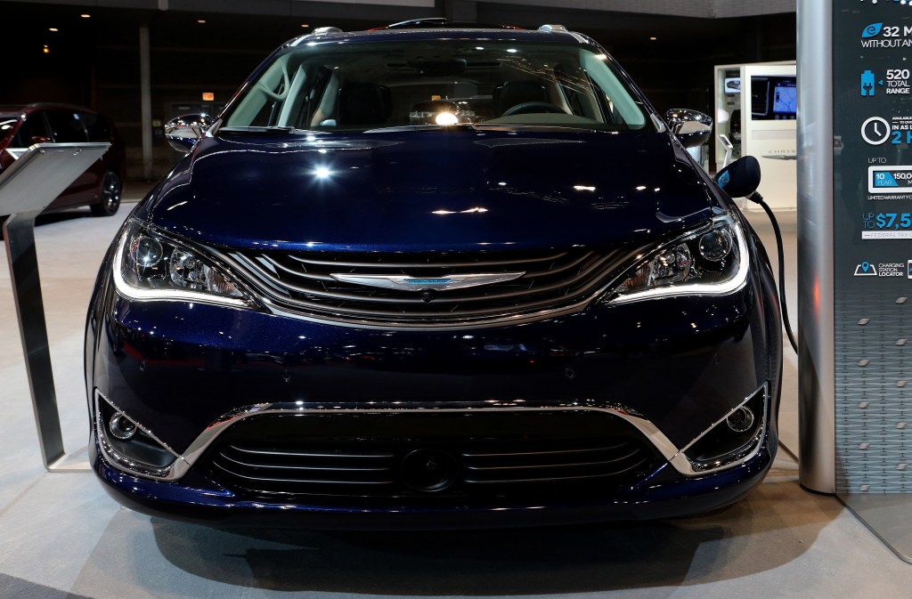 a new Chrysler Pacifica displaying its charging function