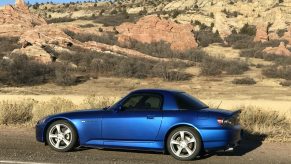 A side view of a Honda S2000 in the desert